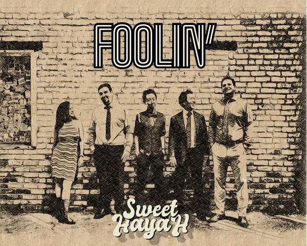 In Sweet HayaH's latest single, "Foolin'," the band's blues-infused journey takes listeners on a soul-searching expedition, guided by Nehal Abuelata's Beth Hart-evoking vocals. As the smooth blues/rock rhythms weave through poignant lyrics questioning self-deception, the song stands as a testament to Sweet HayaH's enduring ability to transport audiences into a nostalgic reverie of sound and introspection.